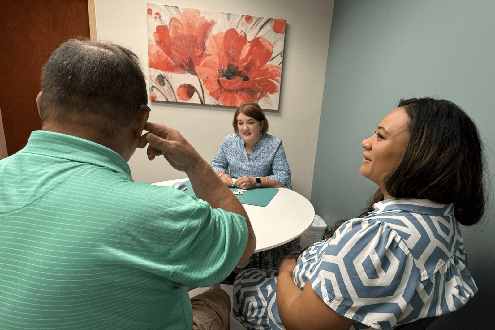 An otoscope exam at All About Audiology
