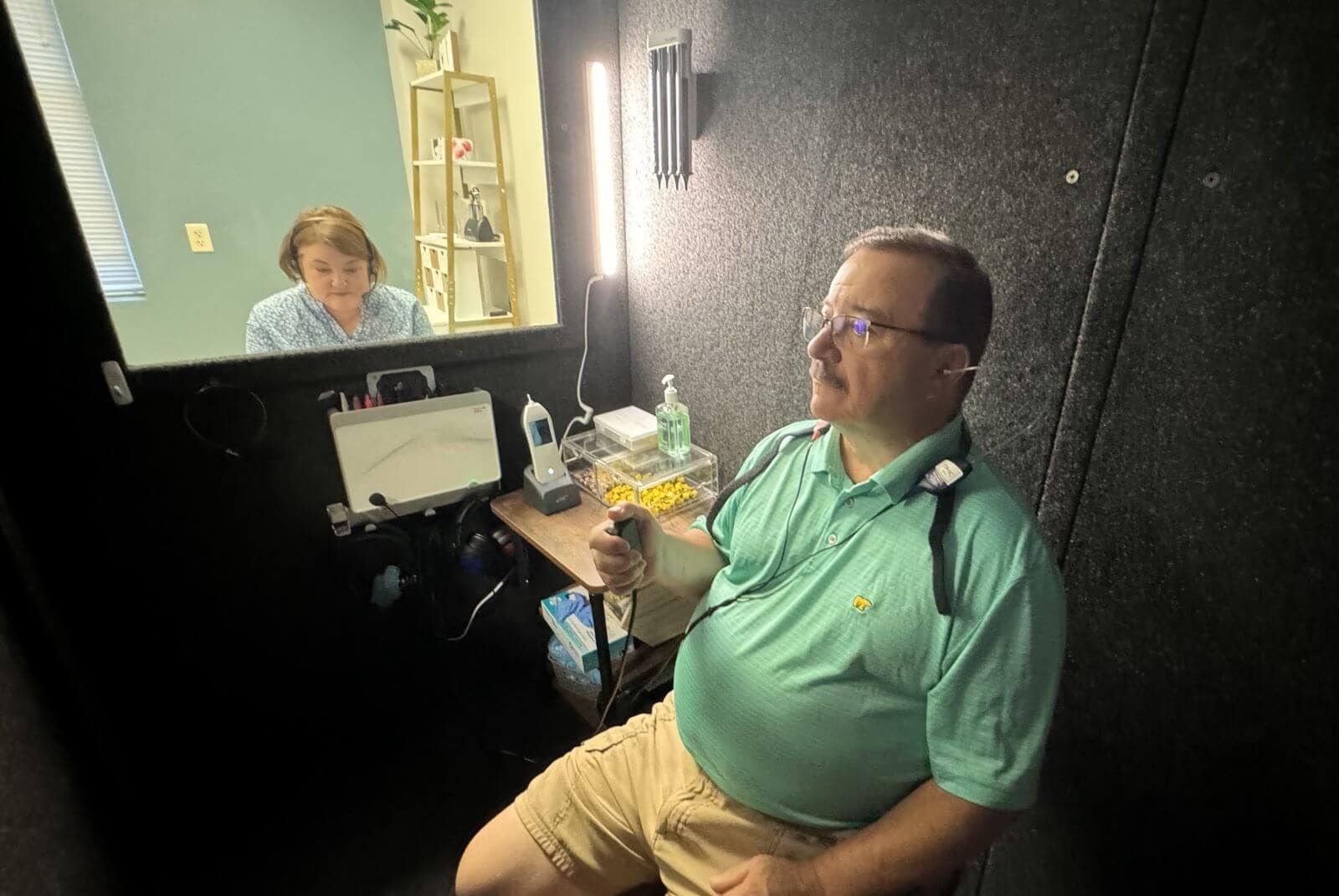 A patient in the sound booth